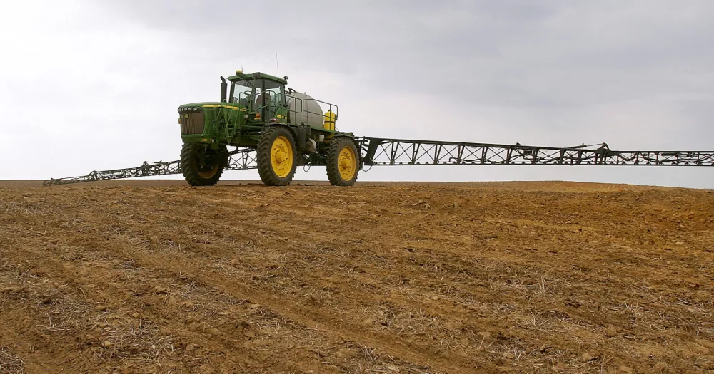 ** ADVANCE FOR MONDAY MAY 26 ** Central Illinois corn and soybean farmer Roy Cook sprays herbicide at the Grigsby farm in Tallula, Ill., on April 25, 2008. Cook uses GPS technology at the farm as as a way to keep costs down by making it possible to spray less fertilizer and fewer herbicides, a benefit in these times of rising costs of fuel, seed, fertilizers and just about everything else it takes to grow crops. (AP Photo/Seth Perlman)