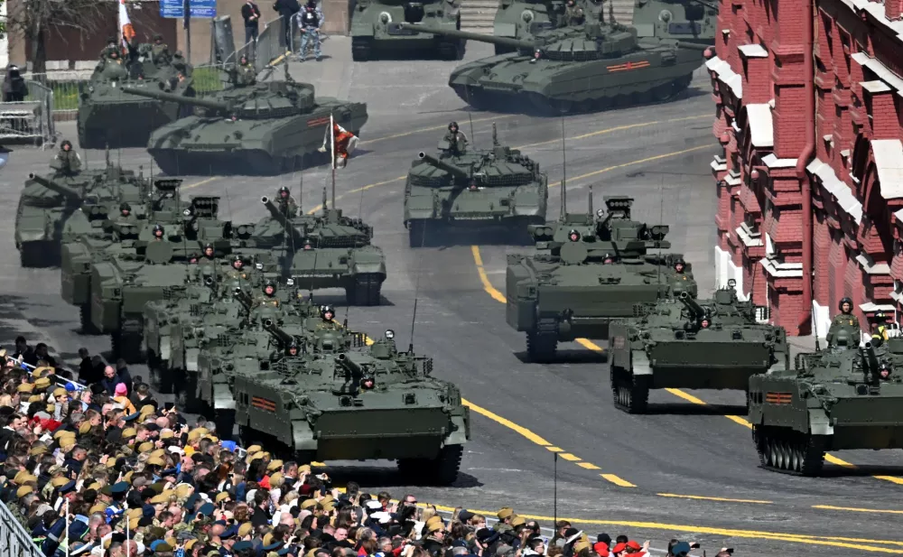 09 May 2025, Russia, Moscow: Russian military vehicles roll through Red Square during the Victory Day parade in Moscow. Russia marks the 80th anniversary of its victory over Nazi Germany in World War II. Photo: -/Kremlin/dpa - ATTENTION: editorial use only and only if the credit mentioned above is referenced in full