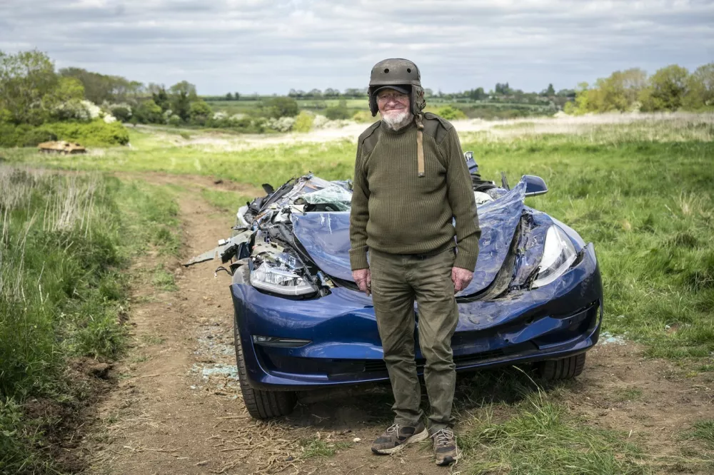 To mark VE Day a 98 year-old who served in the British army in World War Two has destroyed a Tesla with a Sherman tank. Photo released May 7 2025. Before obliterating the car, former Royal Engineer Ken Turner declared: "We crushed fascism before and we'll crush it again." The car was donated by a Tesla owner who is appalled by the support the company's owner Elon Musk has given to the far-right in Europe. Musk has backed the AfD in Germany and gave a Nazi salute at a Trump rally. Speaking from inside the Sherman - which also served in the war, fighting Nazis in Normandy - Ken said: "I'm old enough to have seen fascism the first time around, now it's coming back. Elon Musk, the richest man in the world, is using his immense power to support the far-right in Europe and his money comes from Tesla cars. Well I've got this message for Mr Musk. We've crushed fascism before and we'll crush it again. Let's go!",Image: 996343661, License: Rights-managed, Restrictions: Editorial use, commercial use may require additional licenses. We don't use AI to make images which could be mistaken for news photos. AI use will be clearly indicated. Supplied on condition you ensure personal data is processed in compliance with UK GDPR, Model Release: noFptp: Profimedia