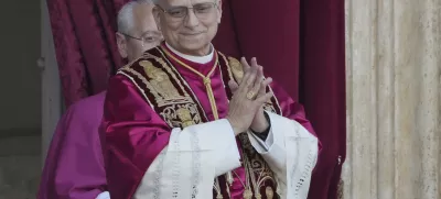 Newly elected Pope Leo XIV appears at the balcony of St. Peter's Basilica at the Vatican, Thursday, May 8, 2025. (AP Photo/Markus Schreiber)