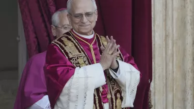 Newly elected Pope Leo XIV appears at the balcony of St. Peter's Basilica at the Vatican, Thursday, May 8, 2025. (AP Photo/Markus Schreiber)