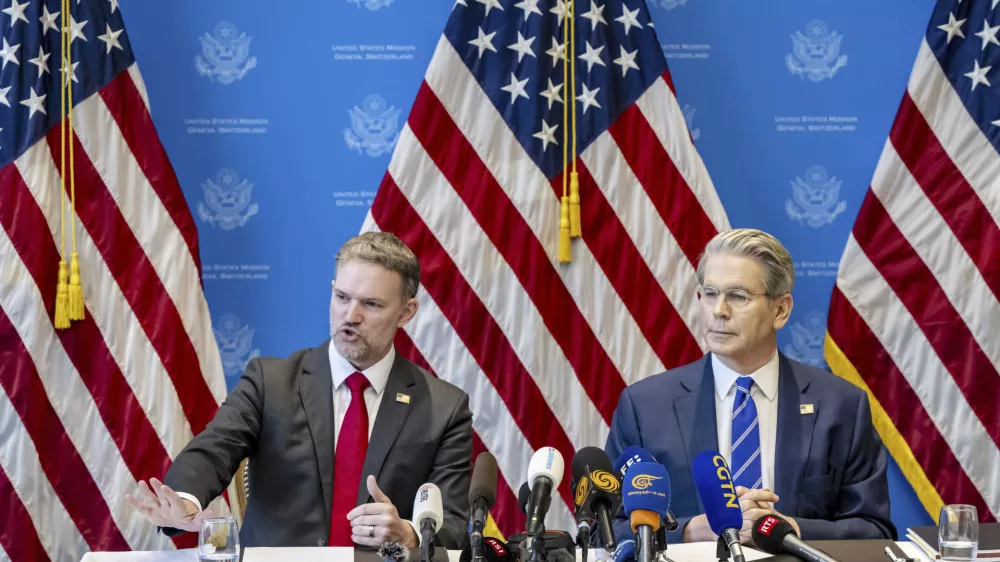 US Trade Representative Jamieson Greer, left, and US Secretary of the Treasury Scott Bessent take part in a press conference after two days of closed-door discussions on trade between the United States and China, in Geneva, Switzerland, Monday, May 12, 2025. (Jean-Christophe Bott/Keystone via AP)