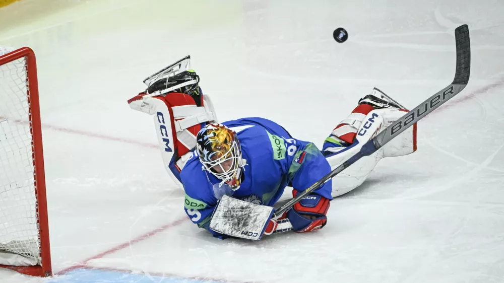 Slovenia's goalkeeper Matija Pintaric in action, during the IIHF Ice Hockey World Championship group A match between Slovakia and Slovenia, at Avicii Arena in Stockholm, Sweden, Sunday, May 11, 2025. (Fredrik Sandberg/TT News Agency via AP)