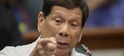 FILE - Former Philippine President Rodrigo Duterte speaks during a senate inquiry on the so-called war on drugs during his administration at the Philippine Senate Monday, Oct. 28, 2024, in Manila, Philippines. (AP Photo/Aaron Favila, File)