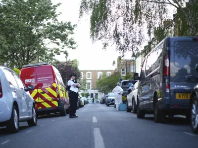 A police officer is seen in Kentish Town, near British Prime Minister Keir Starmer's house in north London, Monday, May 12, 2025. (James Manning/PA via AP)