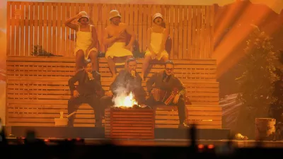 KAJ from Sweden performs the song "Bara Bada Bastu" during the dress rehearsal for the first semi-final of the 69th Eurovision Song Contest, in Basel, Switzerland, Monday, May 12, 2025. (AP Photo/Martin Meissner)