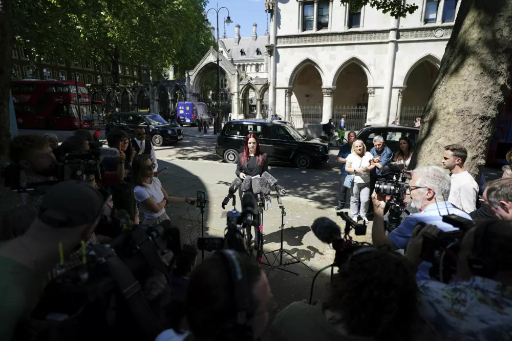 Lawyer Sarah Myatt speaks to the media outside the Royal Courts of Justice, London, Tuesday May 13, 2025, after Peter Sullivan who spent 38 years in a British prison had his murder conviction overturned. (Ben Whitley/PA via AP)