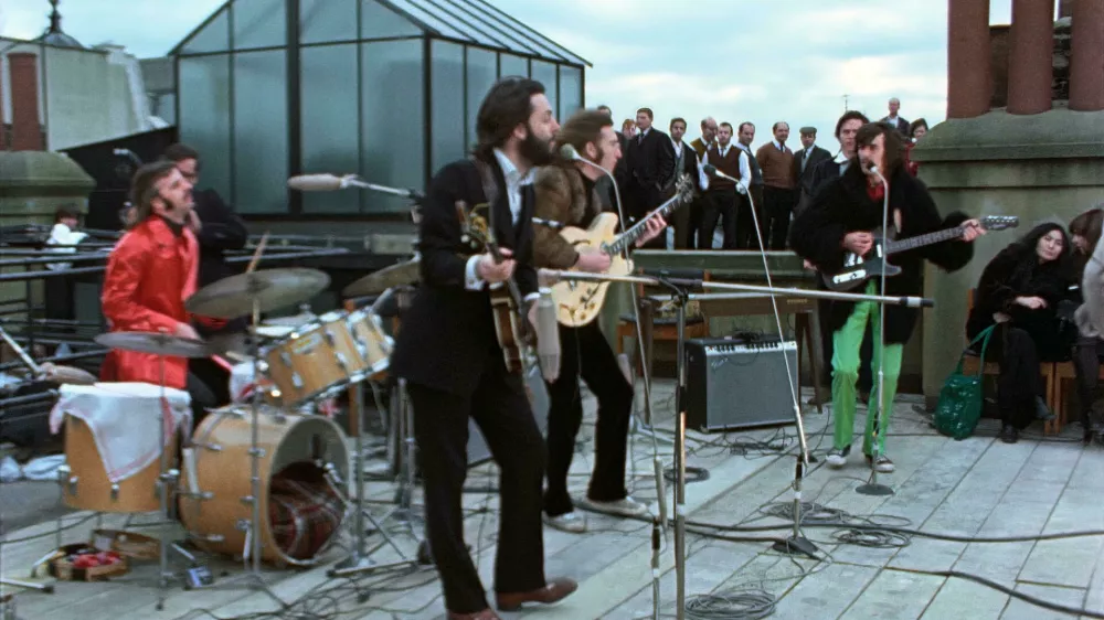 2H7X04G The Beatles' rooftop concert. John Lennon, Paul McCartney, George Harrison and Ringo Starr