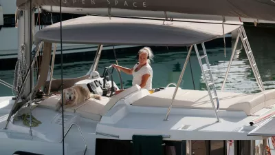 Italy, Sicily, Mediterranean Sea, Marina di Ragusa (Ragusa Province); 16 October 2024, woman with a dog on a catamaran sailing boat in the port - EDITORIAL,Image: 923263012, License: Royalty-free, Restrictions: Contributor country restriction: Worldwide, Worldwide.Contributor usage restriction: Advertising and promotion, Consumer goods.Contributor media restriction: {737D514E-C716-4118-A18D-E772FFAD13E9}, {737D514E-C716-4118-A18D-E772FFAD13E9}., Model Release: no