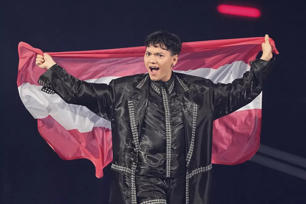 JJ from Austria reacts as he arrives on stage for the Grand Final of the 69th Eurovision Song Contest, in Basel, Switzerland, Saturday, May 17, 2025. (AP Photo/Martin Meissner)