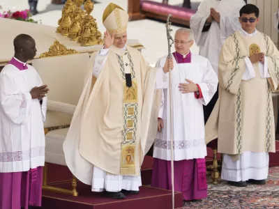 Pope Leo XIV waves at the end of a Mass for the formal inauguration of his pontificate, in St. Peter's Square, at the Vatican, Sunday, May 18, 2025.(AP Photo/Gregorio Borgia)