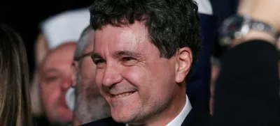 Presidential candidate Nicusor Dan reacts to first exit polls of Romania's second round of the presidential election, in Bucharest, Romania, May 18, 2025. REUTERS/Stoyan Nenov   TPX IMAGES OF THE DAY