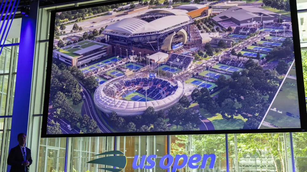 Brian Vahaly, Chairman of the Board and President of USTA speaks at a news conference announcing the redevelopment of Arthur Ashe Stadium and the USTA Billie Jean King National Tennis Center, Monday, May 19, 2025, in New York. (AP Photo/Stefan Jeremiah)