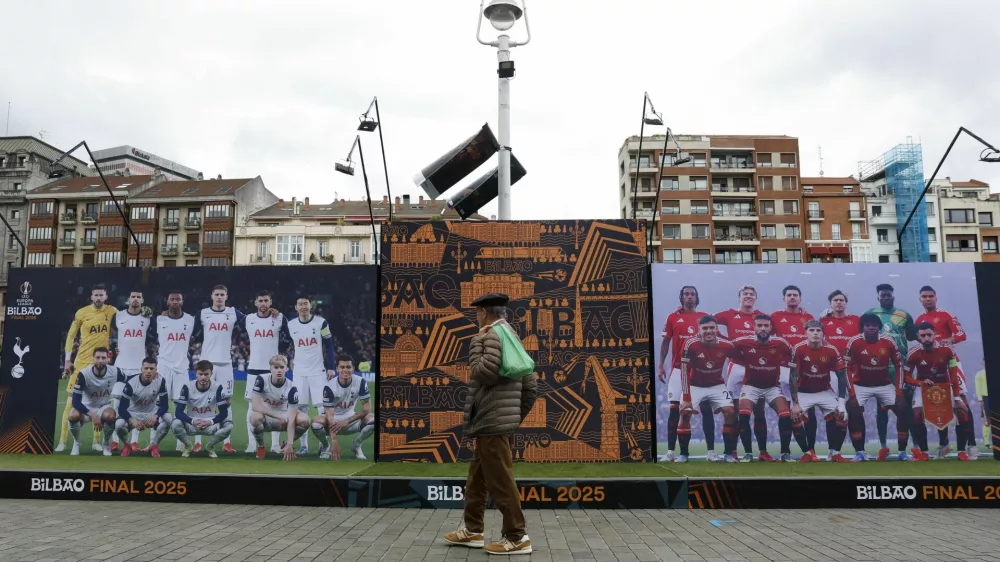 Soccer Football - Europa League - Final - Preview - Tottenham Hotspur v Manchester United - Bilbao, Spain - May 19, 2025 A person walks in a fan zone ahead of the Europa League final REUTERS/Vincent West