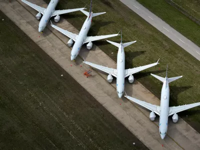 ﻿American Airlines 737 max passenger planes are parked on the tarmac at Tulsa International Airport in Tulsa, Oklahoma, U.S. March 23, 2020. REUTERS/Nick Oxford REFILE - CORRECTING PLANE MODEL AND SLUG, REMOVING REFERENCE TO CORONAVIRUS