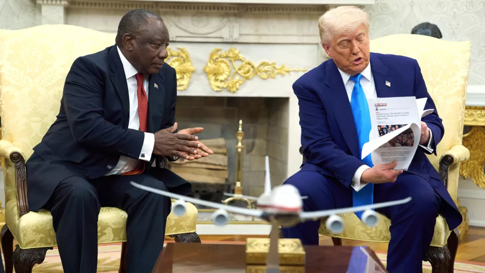 President Donald Trump meets South Africa's President Cyril Ramaphosa in the Oval Office of the White House, Wednesday, May 21, 2025, in Washington. (AP Photo/Evan Vucci)