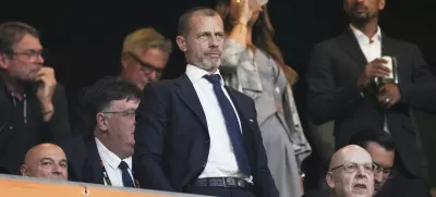 UEFA President Aleksander Ceferin, center, attends during the Europa League final soccer match between Tottenham Hotspur and Manchester United at the San Mames Stadium in Bilbao, Spain, Wednesday, May 21, 2025. (AP Photo/Jose Breton)
