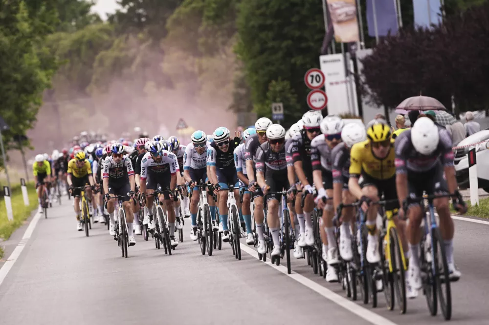 The pack rides during the 14th stage of the Giro d'Italia cycling race from Treviso to Nova Gorica/Gorizia, Italy, Saturday, May 24, 2025. (Marco Alpozzi/LaPresse via AP)