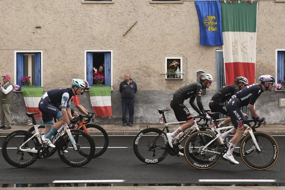 The pack rides during the 14th stage of the Giro d'Italia cycling race from Treviso to Nova Gorica/Gorizia, Italy, Saturday, May 24, 2025. (Marco Alpozzi/LaPresse via AP)