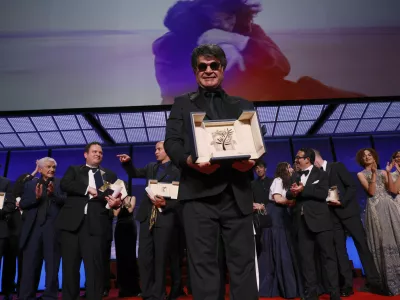 Director Jafar Panahi, accepts the Palme d'Or for the film 'It Was Just an Accident', during the awards ceremony of the 78th international film festival, Cannes, southern France, Saturday, May 24, 2025. (Photo by Joel C Ryan/Invision/AP)