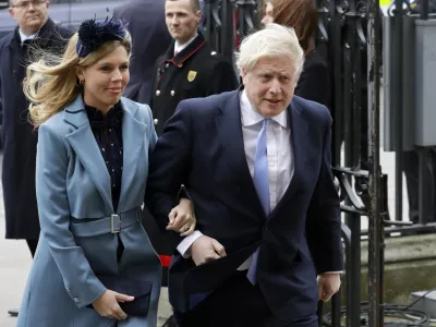 ﻿FILE - In this Monday, March 9, 2020 file photo Britain's Prime Minister Boris Johnson and his partner Carrie Symonds arrive to attend the annual Commonwealth Day service at Westminster Abbey in London. Boris Johnson and his partner Carrie Symonds have announced she gave birth to a "healthy baby boy at a London hospital earlier this morningâ€ť Wednesday April 29, 2020, and both mother and baby are doing well. (AP Photo/Kirsty Wigglesworth, File)