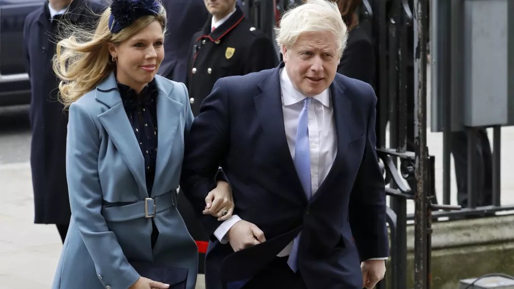 ﻿FILE - In this Monday, March 9, 2020 file photo Britain's Prime Minister Boris Johnson and his partner Carrie Symonds arrive to attend the annual Commonwealth Day service at Westminster Abbey in London. Boris Johnson and his partner Carrie Symonds have announced she gave birth to a "healthy baby boy at a London hospital earlier this morningâ€ť Wednesday April 29, 2020, and both mother and baby are doing well. (AP Photo/Kirsty Wigglesworth, File)