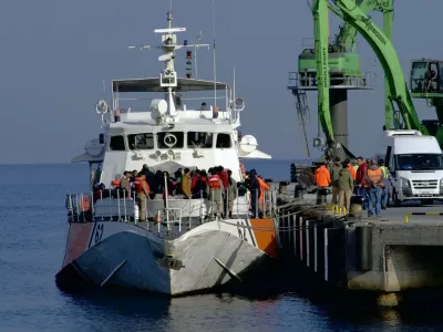 ﻿Migrants disembark after they were apprehended by the Turkish coast guard on the Aegean Sea between Turkey and Greece, in Dikili port, Turkey, Wednesday, April 6, 2016. The group of some 60 people were brought to a coast guard station in the western province of Izmir. The European Union began sending back migrants this week under a deal with Turkey aimed at preventing the flow of migrant to Europe.(AP Photo/Mehmet Guzel)