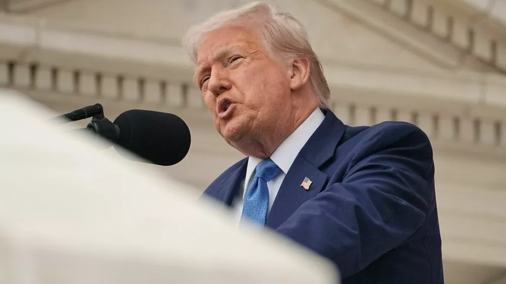 U.S. President Donald Trump delivers remarks at the annual National Memorial Day Observance in the Memorial Amphitheater at Arlington National Cemetery in Arlington, Virginia, U.S., May 26, 2025. REUTERS/Ken Cedeno