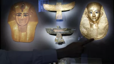 The golden funerary mask at the treasure Tomb of Amenemope at Tanis with other artefacts is displayed, on the day of a press conference held by the Supreme Council of Egyptian Antiquities and the Italian Embassy, in Cairo, Egypt, May 29, 2025. They announced the upcoming exhibition titled "Treasures of the Pharaohs," which will run from October 24, 2025, to May 3, 2026, at Rome's Scuderie del Quirinale, the exhibition will feature masterpieces of pharaonic art from the Egyptian Museum in Cairo. REUTERS/Amr Abdallah Dalsh