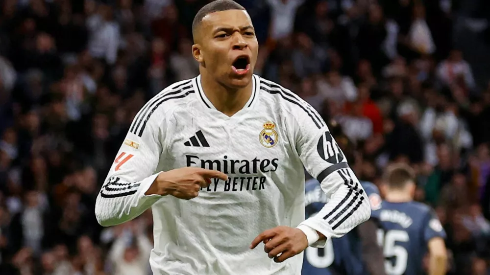 Soccer Football - LaLiga - Real Madrid v Rayo Vallecano - Santiago Bernabeu, Madrid, Spain - March 9, 2025 Real Madrid's Kylian Mbappe celebrates scoring their first goal REUTERS/Susana Vera  TPX IMAGES OF THE DAY