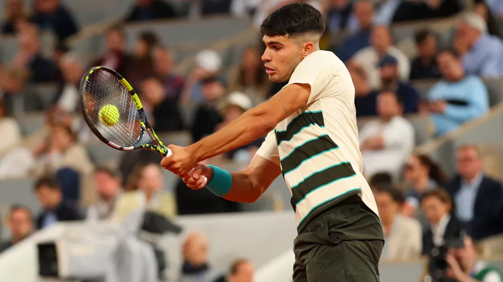 Tennis - French Open - Roland Garros, Paris, France - May 28, 2025 Spain's Carlos Alcaraz in action during his second round match against Hungary's Fabian Marozsan REUTERS/Denis Balibouse