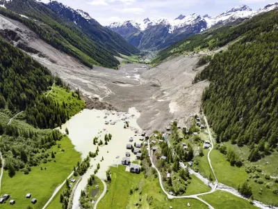 An aerial view shows the destruction of Blatten, Switzerland, Thursday, May 29, 2025, one day after a massive debris avalanche, triggered by the collapse of the Birch Glacier, swept down to the valley floor and demolished large parts of the village. (Jean-Christophe Bott/Keystone via AP)