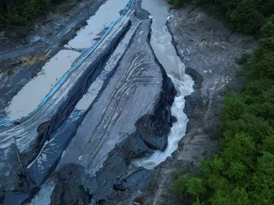The swollen Corund river spills down inside the Praid Salt Mine following increased levels due to floods, in Harghita, Romania, May 28, 2025. Inquam Photos/Alex Nicodim via REUTERS ATTENTION EDITORS - THIS IMAGE WAS PROVIDED BY A THIRD PARTY. ROMANIA OUT. NO COMMERCIAL OR EDITORIAL SALES IN ROMANIA