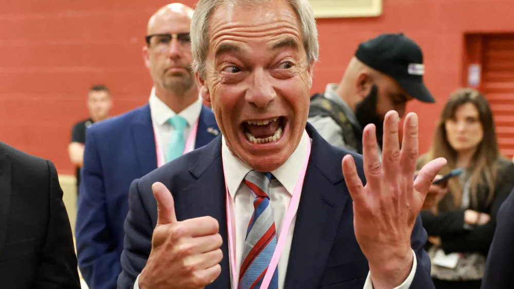 FILE PHOTO: Reform party leader Nigel Farage reacts as the party wins the Runcorn and Helsby by-election, at Halton Stadium in Widnes, Britain, May 2, 2025. REUTERS/Phil Noble/File Photo