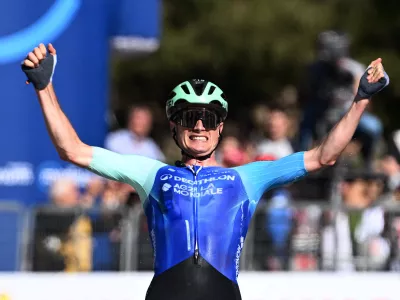 Cycling - Giro d'Italia - Stage 19 - Biella to Champoluc - Italy - May 30, 2025 Decathlon AG2R La Mondiale Team's Nicolas Prodhomme celebrates as he crosses the finish line to win stage 19 REUTERS/Jennifer Lorenzini