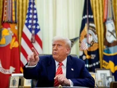U.S. President Donald Trump attends a press conference with Elon Musk (not pictured) in the Oval Office of the White House, in Washington, D.C., U.S., May 30, 2025. REUTERS/Nathan Howard