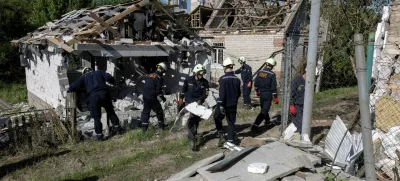 Emergency workers remove debris from a private house that was damaged in a Russian drone strike, amid Russia's attack on Ukraine, in Zaporizhzhia, Ukraine, June 1, 2025. REUTERS/Thomas Peter