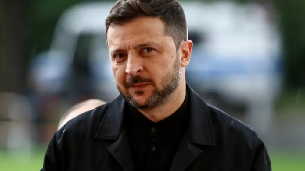 FILE PHOTO: Ukrainian President Volodymyr Zelenskiy at Bellevue Palace for a meeting with German President Frank-Walter Steinmeier, in Berlin, Germany, May 28, 2025. REUTERS/Liesa Johannssen/File Photo