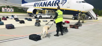 ﻿FILE - In this May 23, 2021, file photo provided by ONLINER.BY, security use a dog to check the luggage of passengers on the Ryanair jet that carried opposition figure Raman Pratasevich, traveling from Athens to Vilnius, Lithuania. The plane was diverted to Minsk, Belarus, after Belarusian flight controllers told the crew that there was a bomb threat against the plane. Pratasevich, who ran a channel on a messaging app used to organize demonstrations against authoritarian President Alexander Lukashenko, left his homeland in 2019 to try to escape the reach of the Belarusian KGB. Pratasevich was arrested upon landing in Minsk and faces 15 years in prison on charges of inciting disturbances. ď»żď»ż(ONLINER.BY via AP)