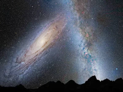 Simbolična. An illustration shows a stage in the potential merger between the Milky Way galaxy and the neighboring Andromeda galaxy, as viewed in Earth's night sky in 3.75 billion years. Andromeda (left) fills the field of view and begins to distort the Milky Way (right) with tidal pull, in this image released by NASA on May 31, 2012. NASA/ESA/Z. Levay and R. van der Marel/ STScI/ T. Hallas and A. Mellinger/Handout via REUTERS/Illustration THIS IMAGE HAS BEEN SUPPLIED BY A THIRD PARTY
