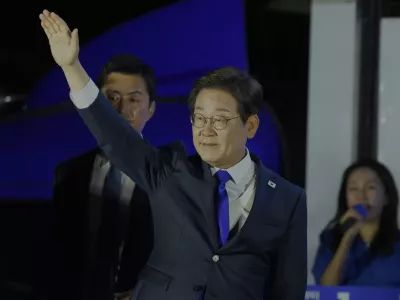 South Korea's Democratic Party's presidential candidate Lee Jae-myung greets supporters outside of the National Assembly in Seoul, South Korea, Wednesday, June 4, 2025. (AP Photo/Ahn Young-joon)