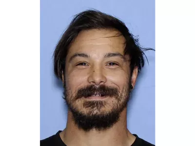 This undated photo provided by the Wenatchee Police Department shows Travis Caleb Decker who the police are asking the public for help in locating the Washington state father who is wanted for murder after his three young daughters were reported missing and then found dead. (Wenatchee Police Department via AP)