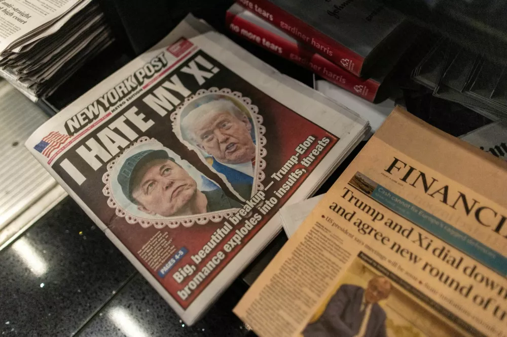 A newspaper front page featuring U.S. President Donald Trump and Elon Musk is displayed at a shop at Ronald Reagan Washington National Airport in Arlington, Virginia, U.S., June 6, 2025. REUTERS/Carlos Barria