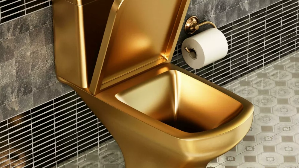 2D6YWG5 Golden toilet in luxury bathroom. 3D illustration.zlata školjka