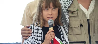 Climate activist Greta Thunberg with other activists from a human rights organization meets with journalists in Catania, Italy, Sunday, June 1, 2025, ahead of their departure for the Mideast. (AP Photo/Salvatore Cavalli)