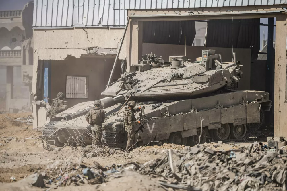 08 June 2025, Palestinian Territories, Khan Yunis: Israeli military vehicles drive along Salah al-Din Roadin the southern Gaza Strip. Photo: Ilia Yefimovich/dpa