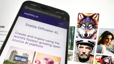 FILE - The desktop and mobile websites for Stable Diffusion are pictured, Oct. 24, 2023, in New York. (AP Photo/John Minchillo, File)