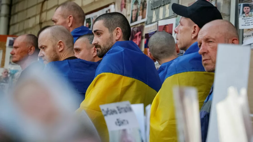 Ukrainian prisoners of war (POWs) are seen as they return after a swap, amid Russia's attack on Ukraine, in an undisclosed location in Ukraine June 10, 2025. REUTERS/Maksym Kishka