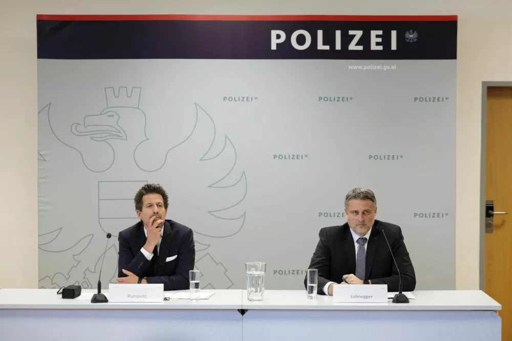 Arnulf Rumpold, media spokesperson for the Graz Public Prosecutor's Office and Michael Lohnegger, Head of the Styrian State Criminal Police Office attend a press conference, following a deadly shooting at a secondary school, in Graz, Austria, June 12, 2025. REUTERS/Leonhard Foeger
