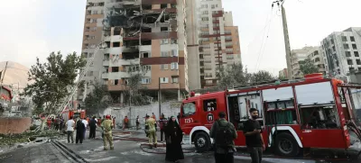 Firefighters work at the scene of a damaged building in the aftermath of Israeli strikes, in Tehran, Iran, June 13, 2025. Majid Asgaripour/WANA (West Asia News Agency) via REUTERS  ATTENTION EDITORS - THIS PICTURE WAS PROVIDED BY A THIRD PARTY   TPX IMAGES OF THE DAY